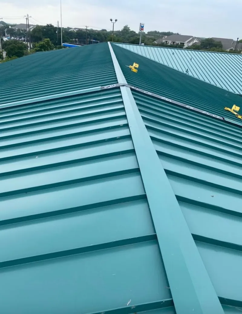 Green commercial metal roof ridge and valley for Metal Roof Repair in Lake Tapps